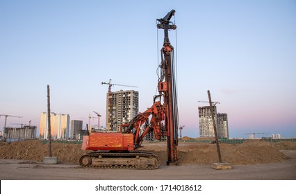 Vertical tamrock pile foundation drilling machine. Drill rig at construction site. Ground Improvement techniques, vibroflotation probe. Vibro compaction method. Piling Contractors 