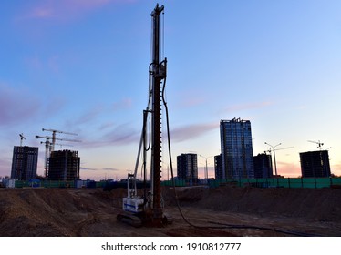 Vertical tamrock pile foundation drilling machine. Drill rig at construction site. Ground Improvement techniques, vibroflotation probe. Vibro compaction method. Piling Contractors. Out of focus