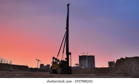 Vertical tamrock pile foundation drilling machine. Drill rig at construction site. Ground Improvement techniques, vibroflotation probe. Vibro compaction method. Piling Contractors. Out of focus
