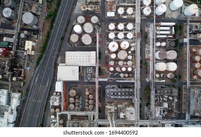 Vertical Top Down View Of A Chemical Plant With Pipelines & Storage Tanks Laid Out Throughout The Factory In A Petrochemical Industrial Estate, In Kaohsiung City, Taiwan, Asia (in Flat Lay Mode)