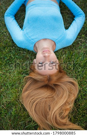 woman among daisies