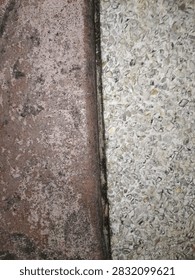 Vertical Two Tone Split Concrete and Pebble Wash Wall Texture Background