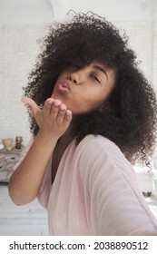 Vertical Video Pov. Trendy Happy Mixed Woman Vlogger Dances And Recording Videostream Video For Social Media. Enjoyed Female Taking Selfies Using Smartphone. Creating Dancing Video Using Tiktok App.