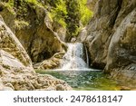 A vertical view of the beautiful river "Zeus Bath" on historic Mount Olympus