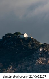 Vertical View Of The Church Of Castellare, Vicopisano, Pisa, Italy, Against A Sky With Dark Clouds	