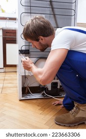 Vertical View Of Fridge Repair At Home