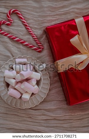 Vertical View of Heart Shaped Candy Canes with Gift Boxes and Marshmallow Mug