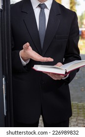 Vertical View Of Jehovah's Witness Evangelizing