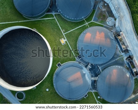 
Vertical view of the process components, fermenters and biogas storage tanks of the agricultural biogas plant. Use of biogas in cogeneration units for electricity and heat production.