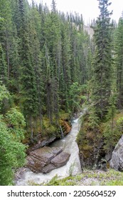 Vertical View Of The River With Various Bedrock Layers Of Maligne Canyon, AB, Canada,  A Slot Canyon In Jasper National Park Near Jasper Which Has Eroded Out Of The Palliser Formation