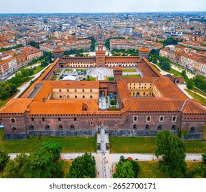 Vertical view of Sforza Castle’s clock tower in Milan, showcasing medieval architecture, red bricks, and historic design. Perfect for travel, tourism, and cultural heritage visuals.