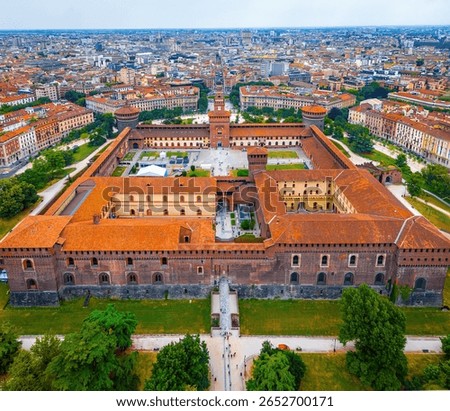 Vertical view of Sforza Castle’s clock tower in Milan, showcasing medieval architecture, red bricks, and historic design. Perfect for travel, tourism, and cultural heritage visuals.