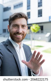 Vertical View Smartphone Camera Caucasian Bearded Businessman Speaks On Phone Using A Front Camera On A Video Call. Employee Business Man Talking On Webcam. Conversation Of An Office Worker In Suit