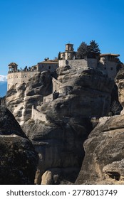 Vertical View of St. Stephen Monastery Entrance and Rock Cliffs