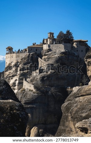 Vertical View of St. Stephen Monastery Entrance and Rock Cliffs