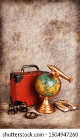 Vertical vintage travel background with old globe compass suitcase plane binoculars and notes