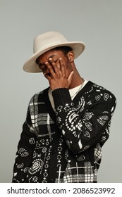 Vertical Waist Up Portrait Of Anonymous African American Man Wearing Hat In Fashion