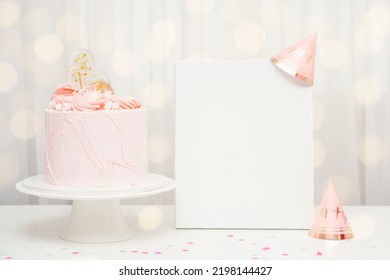 Vertical White Blank Poster Mockup Stands With Birthday Pink Cake And Birthday Cap And Holiday Attributes. Place For Text And For Your Content