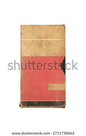 A vertically oriented, worn, and closed VHS cardboard sleeve with a red, black, and beige design.