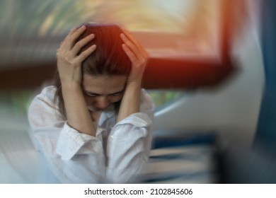 Vertigo illness concept. Woman hands on her head felling headache dizzy sense of spinning dizziness,a problem with the inner ear, brain, or sensory nerve pathway.