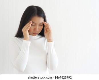 Vertigo Illness And Sick Building Syndrome Or SBS, Brain Atrophy In Asian Woman, She Use Hand Touching Head And Felling Headache Dizzy Sense Use For Health Care Concept.