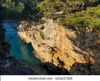 Verudela Canyon At Verudela Peninsula, South From Pula, Istria, Croatia In January Winter Sun. Cliff Enlighted With Low Sun.