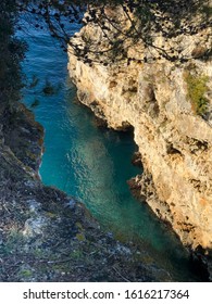 Verudela Canyon At Verudela Peninsula, South From Pula, Istria, Croatia In January Winter Sun. A Cliff View.