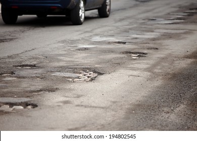 Very Bad Quality Road With Potholes