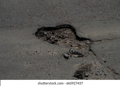 Very Bad Quality Road With Potholes