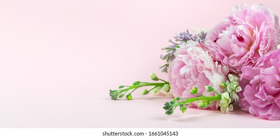 Very beautiful bouquet of flowers from peonies, and lilacs , spring plants close-up. Holiday concept. Flowers for Mother's Day. Copy space. - Shutterstock ID 1661045143