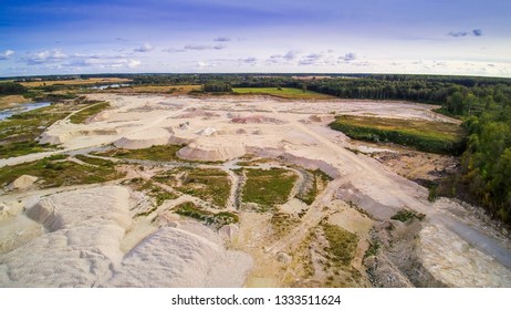 The very big limestone quarry area with lots of white powdered limestones and big stones