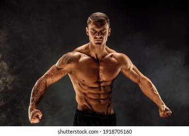 Very Brawny Guy Bodybuilder Posing. Beautiful Sporty Guy Male Power. Fitness Muscled Man. Roar.