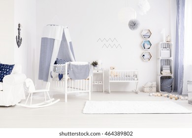 Very Bright And Pure Baby Room Decor In Marine Style, With Canopy Cot, White Cradle And Carpet