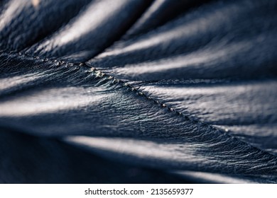 Very Close Up Black Leather Sofa. Abstract View Of Fragment Of Old Leather Sofa.