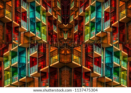  Very colorful building projected in an artistic, symmetrical form. It gives the effect of a kaleidoscope. There are many balconies and windows which are multicolored and with attractive pattern.