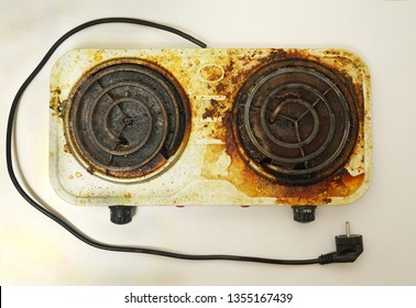 Very Dirty Two Burner Electric Stove. Old Mud And Grease. Top View. 