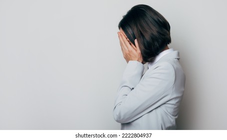 Very distressed young business lady feeling sad, crying and sobbing. Concept of business, finance and employment. - Shutterstock ID 2222804937