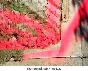 a very funky abstract painiting of wooden textures and warning paint