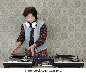 a very funky elderly granny dj! go lady!