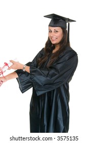 Very Happy Beautiful Young Woman Standing In Graduation Robes, Cap And Gown Receiving Her Diploma Or Degree.