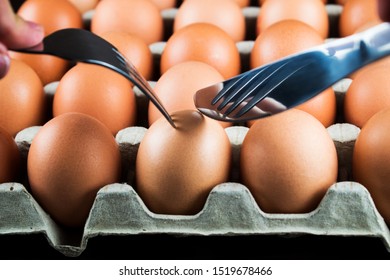 A Very Hungry Man Is Going To Eat A Whole Tray Of Eggs. Hungry Athlete After A Hard Workout Is Going To Eat Eggs. Eggs Are One Of The Main Sources Of Protein.