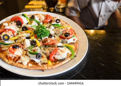 the very italian pizza coming out of a wood burning pizza oven - Powered by Shutterstock