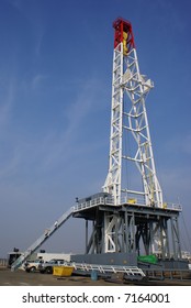 A Very Large Oil Well Drilling Rig Sets Up In Kern County, California