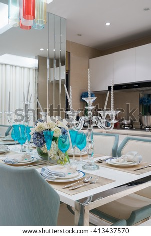 very nice dining room with tableware
