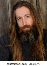 Very Nice Headshot Of A Man With Long Hair And Beard