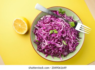 Very Nutritious And Healthy Bowl Of Red Cabbage Salad Served In A Bowl With Lime. Low Calorie, Vegetarian Superfood For Diet.