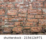 Very old brick wall, rebuilt wonky. Background texture