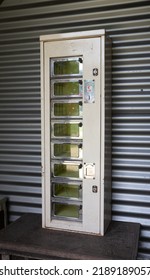 Very Old Empty Vending Machine, Outside On A Table