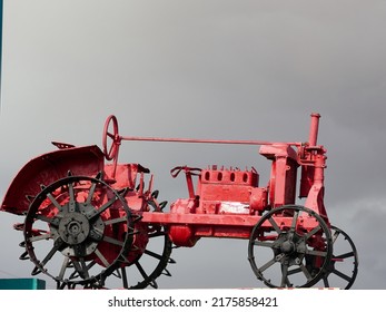 Very Old Farm Tractor.  Red