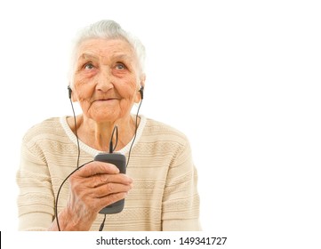 very old lady isolated on white  listening to music on the phone